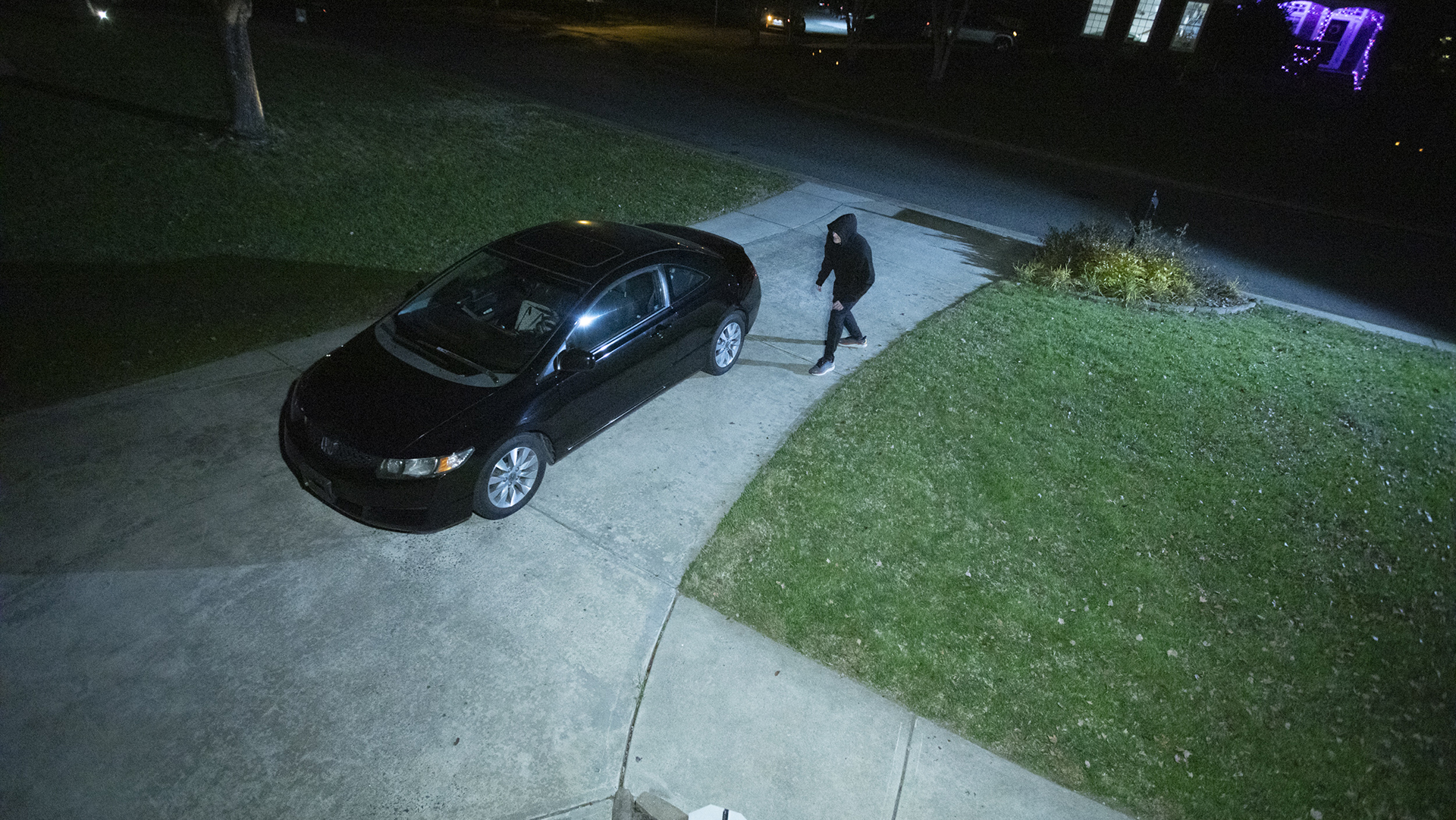 Thief approaching car